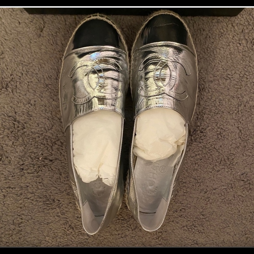 Chanel Silver leather espadrilles.